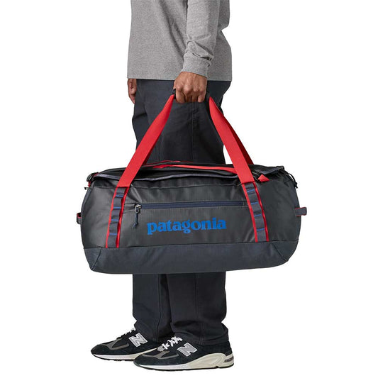 Black Hole Duffel 55L - Smolder Blue w/ Amanita Red