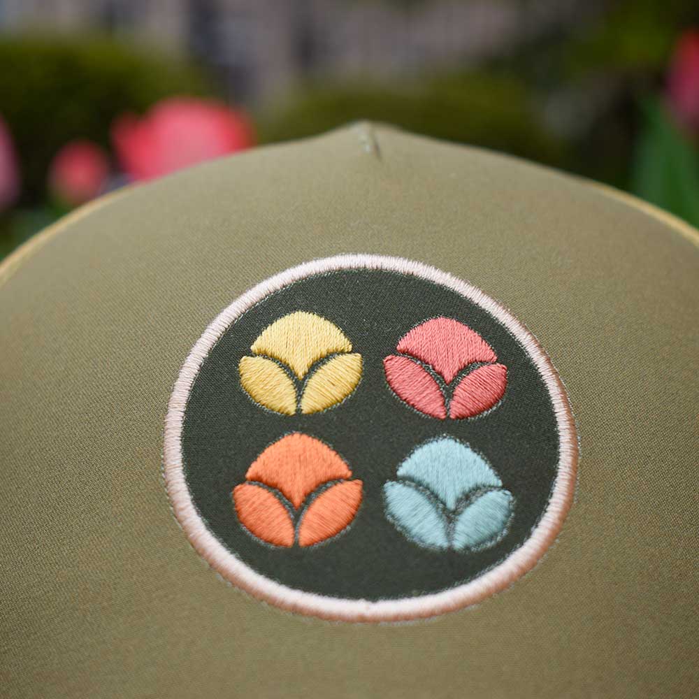 Tulip Time Running Trucker - Olive