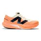 Men's FuelCell Rebel v4 Running Shoe - Hot Mango/Angora - Regular (D)