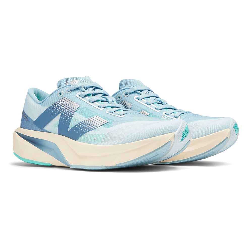 Women's FuelCell Rebel v4 Running Shoe - Quarry Blue/Chrome Blue - Wide (D)